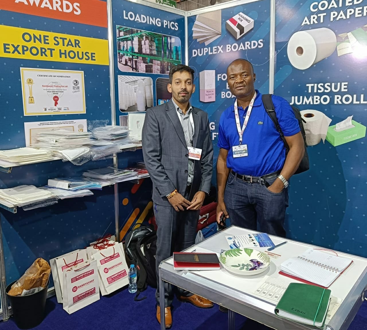 Photo of Nandyavart Group members interacting at Paper Me Exhibition Cairo 2023